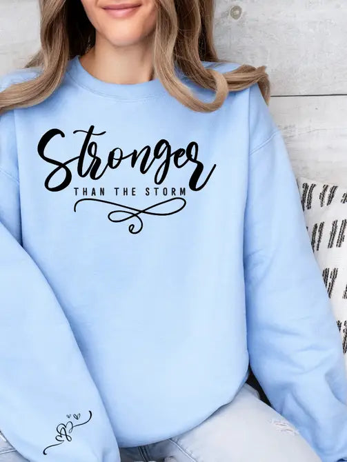 Stronger Than The Storm Graphic Sweatshirt STYLE SOURCE