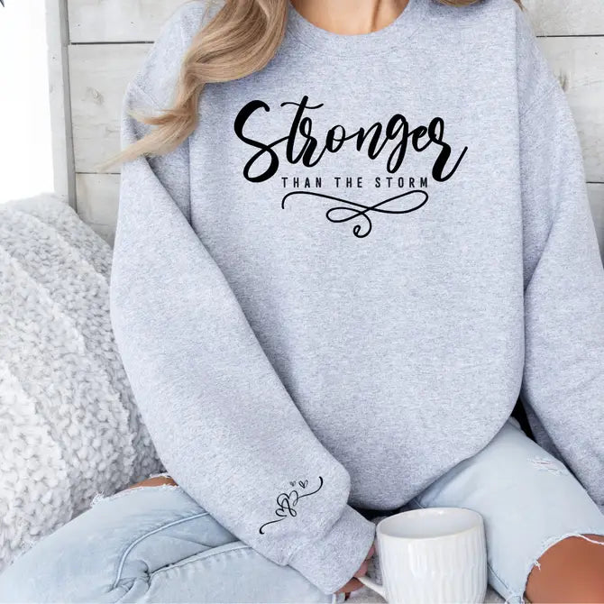 Stronger Than The Storm Graphic Sweatshirt STYLE SOURCE