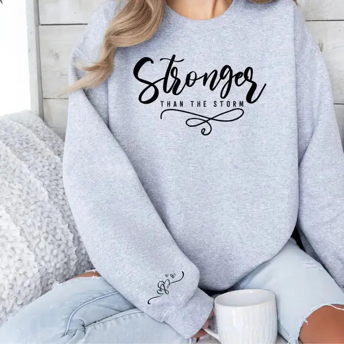 Stronger Than The Storm Graphic Sweatshirt STYLE SOURCE